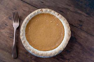 personal mini pumpkin pie for one flat lay photo