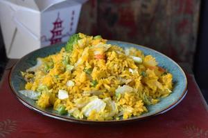 Chinese plated yellow fried rice photo