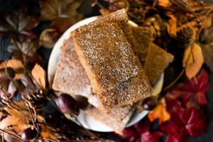 Gingerbread squares in fall holiday setting photo