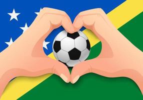 Balón de fútbol de las Islas Salomón y forma de corazón de mano vector
