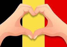 Bandera de Bélgica y forma de corazón de mano vector