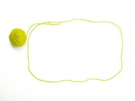 Knitting yarn on white background photo