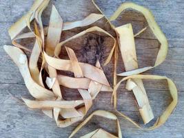 Ketupat or Rice Dumpling On Wooden Background. Indonesian culinary food photo