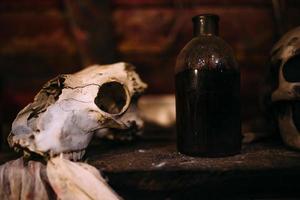 Antique medical bottle. Dark mystery halloween concept photo