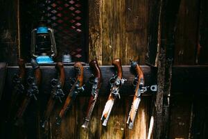 A set of old pistols on the shelf of a gift shop. Medieval weapons. photo