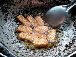 Tempe goreng or Fried Tempeh. Indonesian culinary food photo
