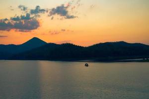 twilight sky river sunset yellow color landscape lake evening time clouds and mountains photo