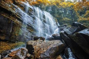 Autumn waterfall landscape forest mountain and bamboo tree wild tropical waterfall thailand