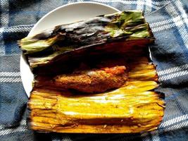 Pepes Ikan Bakar or grilled steamed fish. Indonesian culinary food photo