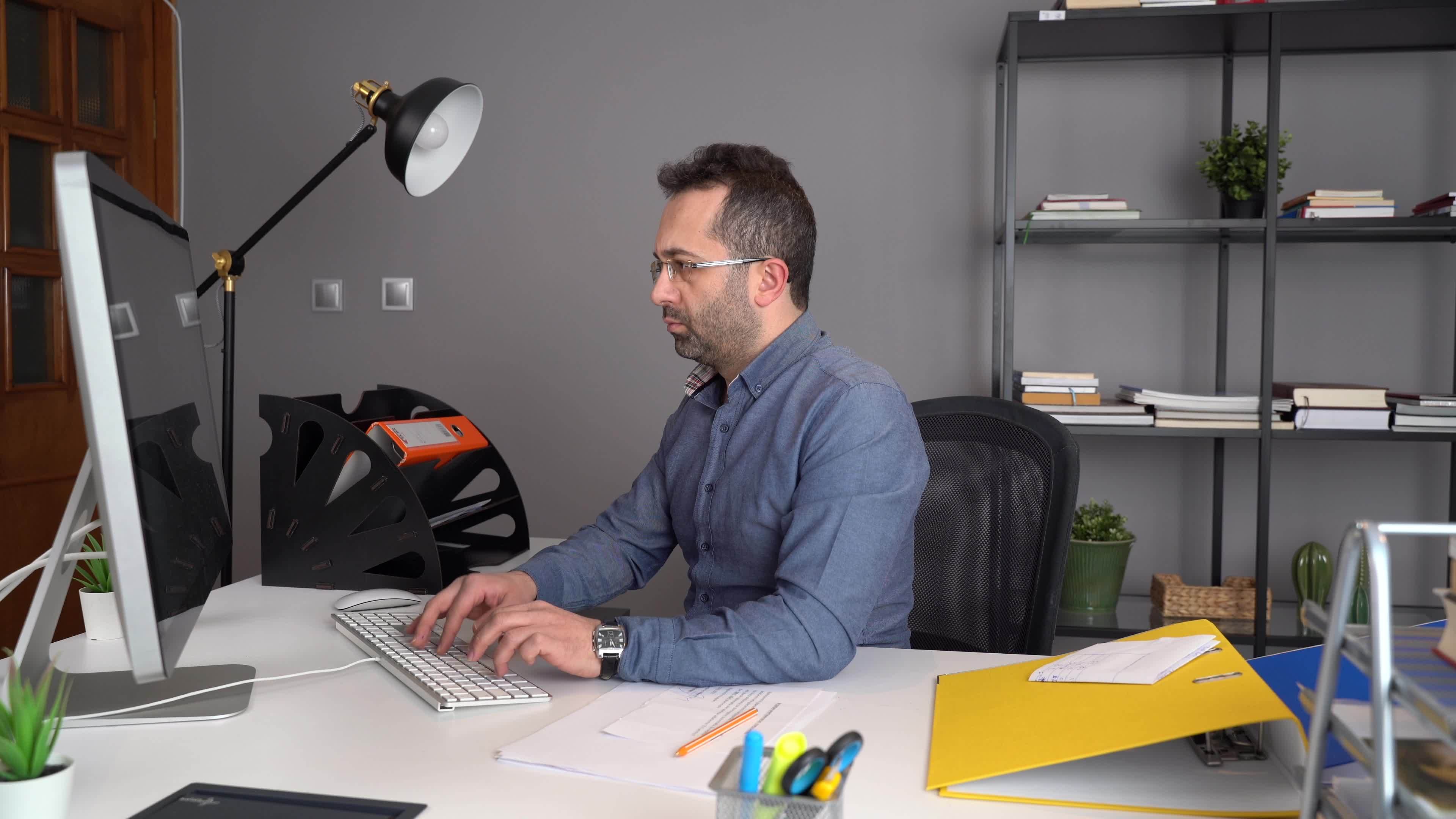 Home office worker. Home office worker working hard at home and using