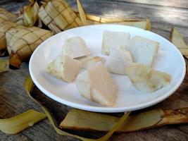 Ketupat or Rice Dumpling On a plate. Indonesian culinary food photo