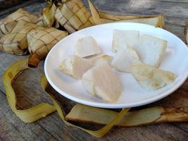 Ketupat or Rice Dumpling On a plate. Indonesian culinary food photo