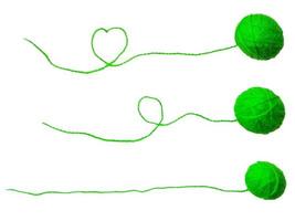 Three of knitting yarn on white background photo