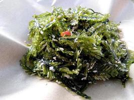 Rujak Bulung Boni Khas Bali or seaweed rujak. Indonesian culinary food photo