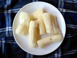 Singkong Rebus or boiled cassava on a plate. Indonesian culinary food photo