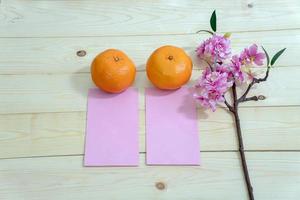 Accessories on Lunar New Year  Chinese New Year.Orange on the table wood . photo