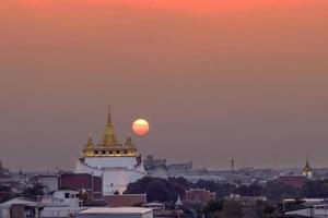 Sunset at golden mount temple photo