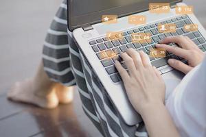 Woman hands using social network with laptop, Social media and connection communication concept. photo