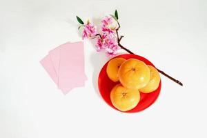 Above view of Orange - Fruit accessories on Lunar New Year Chinese New Year holiday background concept. photo