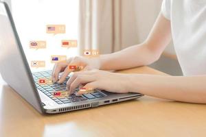 Woman hands using social network with laptop, Chat with international photo