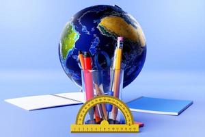 School stationery.  Colored pencils, colored ink pens, a regular pencil with a red rubber band, rulers, globe,  notebook  and others  on a  blue background. 3D illustration. photo