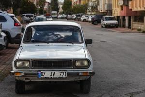 Side  Turkey   February 20 2022 white Renault 12   is parked  on the street on a warm  autumn  day photo