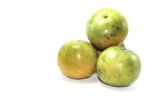 Thailand tangerine on a white background with high vitamin C, suitable for eating, playing and making fruit smoothies for health and body care. photo