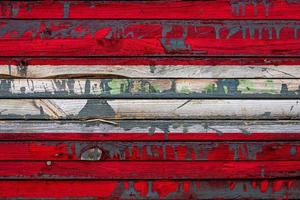 The national flag of Austria  is painted on uneven boards. Country symbol. photo