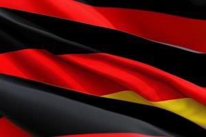 The national flag of Germany from textiles close up in three versions, soft focus photo