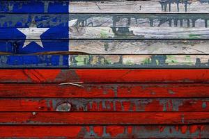 The national flag of Chile  is painted on uneven boards. Country symbol. photo