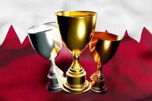 3d illustration of a cup of gold, silver and bronze winners on the background of the national flag of  Qatar. 3D visualization of an award for sporting achievements photo