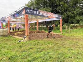 Cholmondeley in Cheshire in the UK in September 2021. Participants in a Tough Mudder event photo