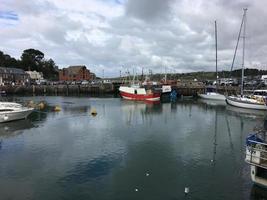 Padstow in Cornwall in August 2020. A view of Padstow Harbour showing all the fishing boats photo