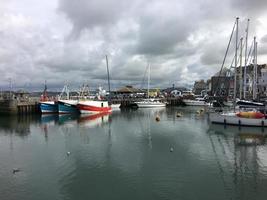 Padstow in Cornwall in August 2020. A view of Padstow Harbour showing all the fishing boats photo