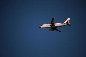 London in the UK in November 2020. A view of a plane passing over Richmond Park photo