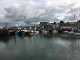 Padstow in Cornwall in August 2020. A view of Padstow Harbour showing all the fishing boats photo
