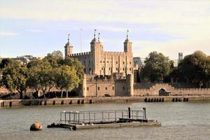 A view of the Tower of London across the river Thames photo