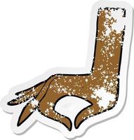 retro distressed sticker of a cartoon hand symbol vector