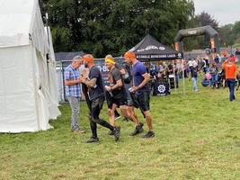 Cholmondeley in Cheshire in the UK in September 2021. Participants in a Tough Mudder event photo
