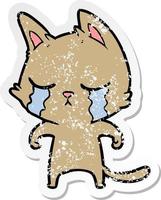 distressed sticker of a crying cartoon cat vector