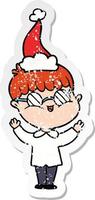 distressed sticker cartoon of a boy wearing spectacles wearing santa hat vector