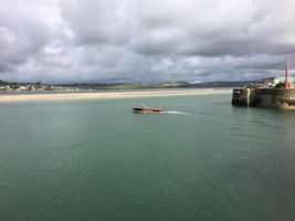 Padstow in Cornwall in August 2020. A view of Padstow Harbour showing all the fishing boats photo