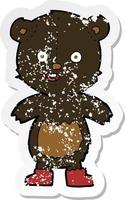 retro distressed sticker of a cartoon happy teddy bear in boots vector