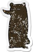 retro distressed sticker of a funny cartoon black bear vector