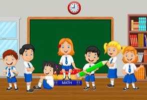 Group of elementary school kids in the class room vector