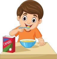 niño pequeño de dibujos animados desayunando cereales vector