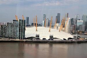 An aerial view of London over the River Thames near the Isle of Dogs photo