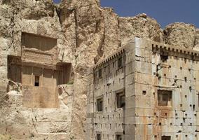 The massive tombs of Persian kings Darius and Xerxes near Persepolis in Iran photo