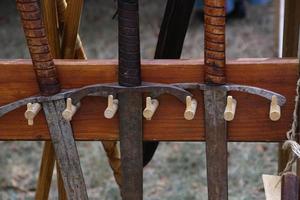 Weathered swords at a medieval festival in Germany photo
