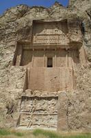 The massive tombs of Persian kings Darius and Xerxes near Persepolis in Iran photo